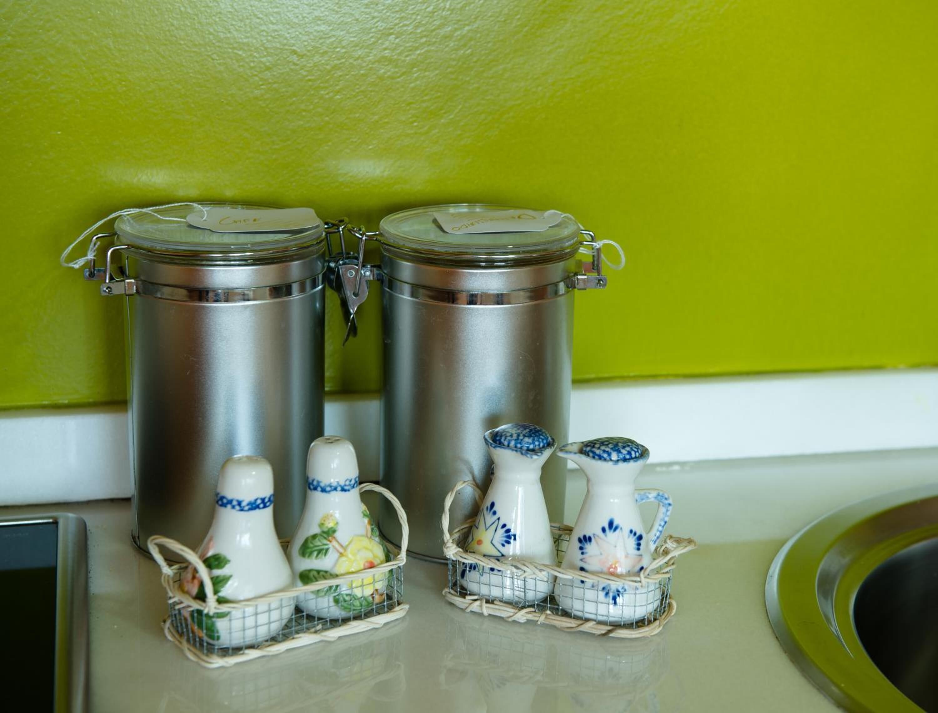 full-sized fridge, microwave, stovetop, coffee/tea maker