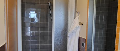 Shower, bathrobes, bidet, towels