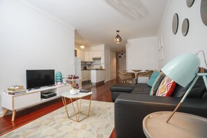 Apartment, 1 Bedroom, Balcony, Partial Sea View | Living room | Flat-screen TV - Forum Apartment (Funchal)