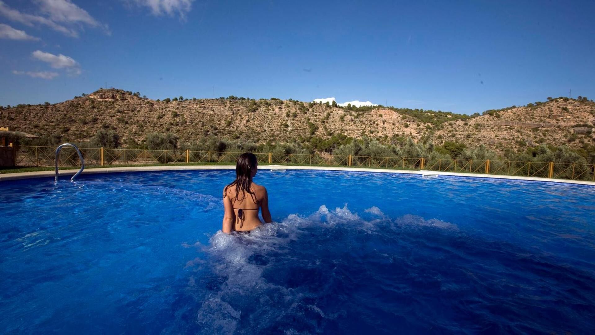 Outdoor pool, pool umbrellas, pool loungers