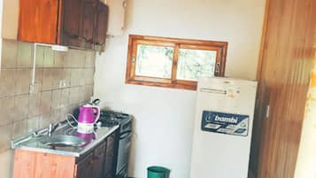 Fridge, microwave, stovetop, cookware/dishes/utensils
