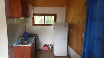 Fridge, microwave, stovetop, cookware/dishes/utensils