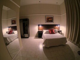 Ropa de cama de alta calidad y minibar