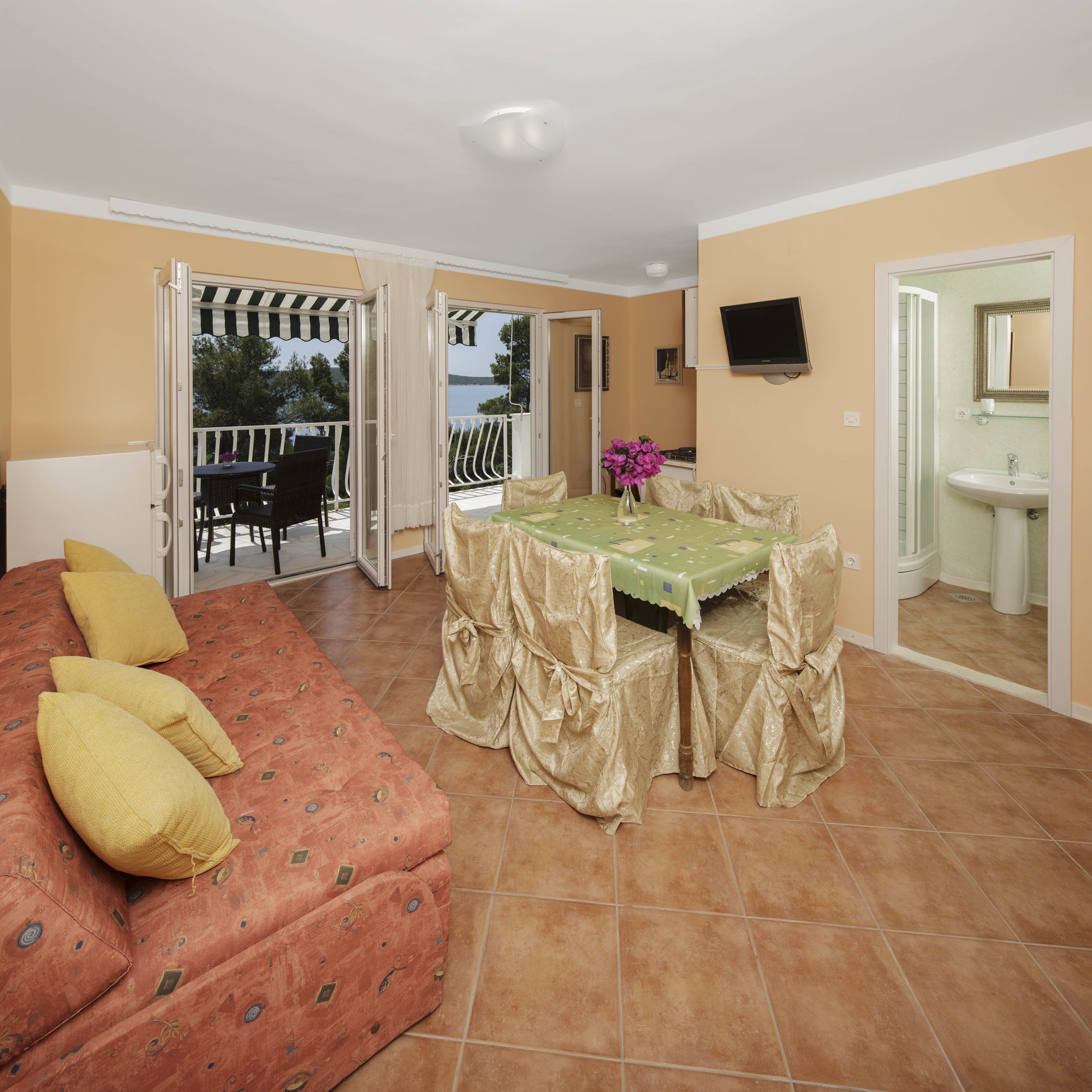 Apartment, Sea View (4 Adults) | Living area | LCD TV