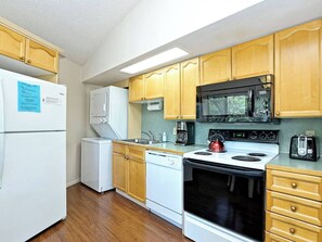 Fridge, microwave, oven, stovetop - Villa Canopy #11 - Elevated Treehouse with Pool & Hot Tub Access (Lakeway)