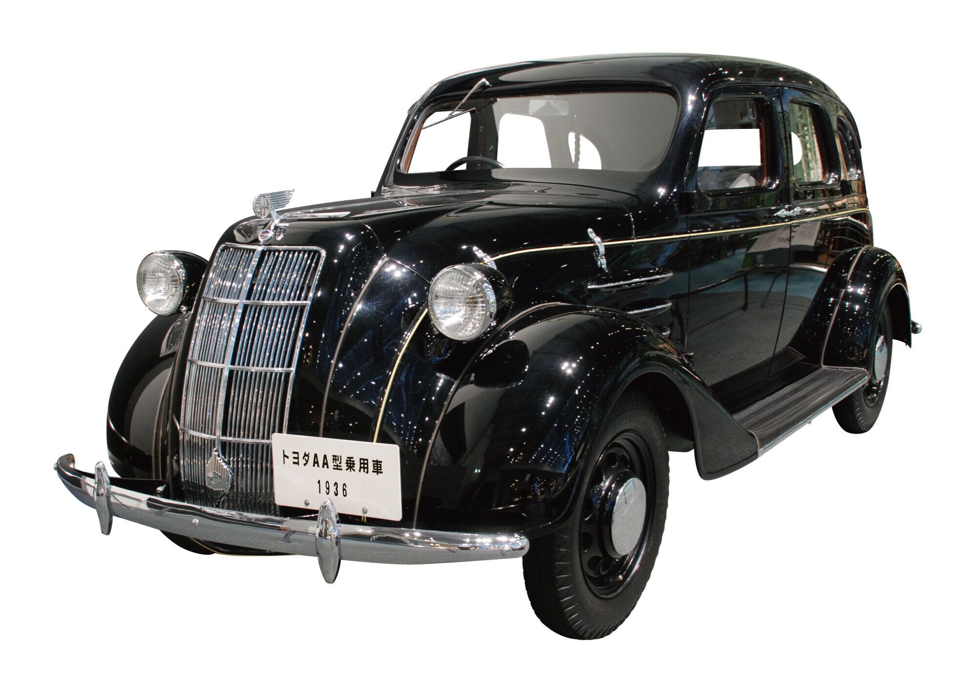 Ein klassischer, schwarzer Wagen mit Chromgrill und Scheinwerfern, einem Nummernschild und zeitlosem Design.
