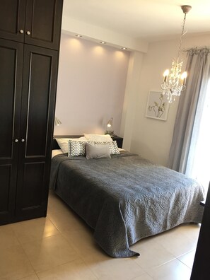 2 dormitorios, tabla de planchar con plancha, wifi gratis y ropa de cama