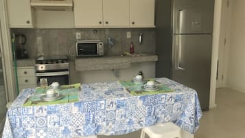 Fridge, microwave, cookware/dishes/utensils