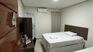 Minibar, desk, blackout curtains, iron/ironing board