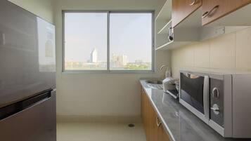 Family Apartment | 3 bedrooms, blackout curtains, iron/ironing board, rollaway beds