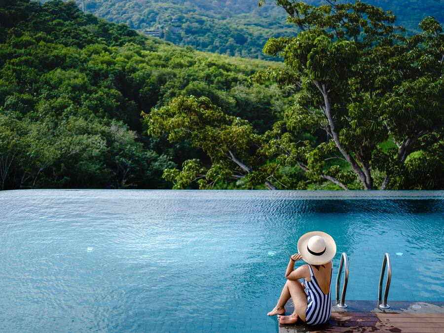 2 outdoor pools, open 8:00 AM to 8:00 PM, pool umbrellas, pool loungers