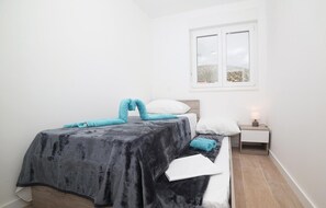 2 chambres, accès au Wi-Fi (inclus), literie fournie