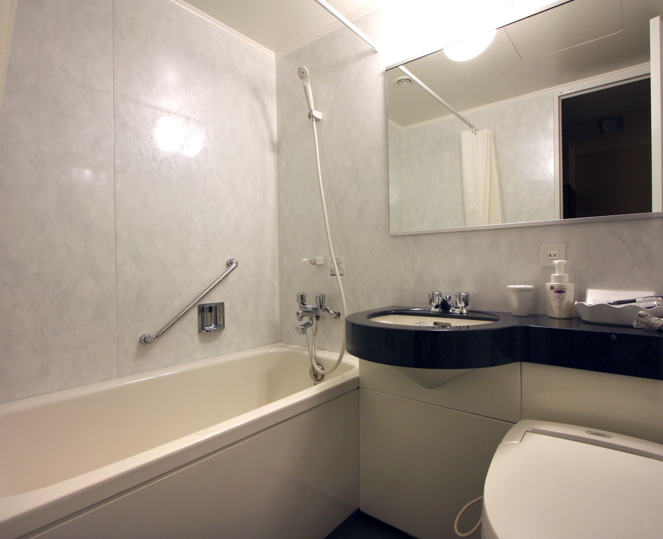 free toiletries, hair dryer, slippers, electronic bidet