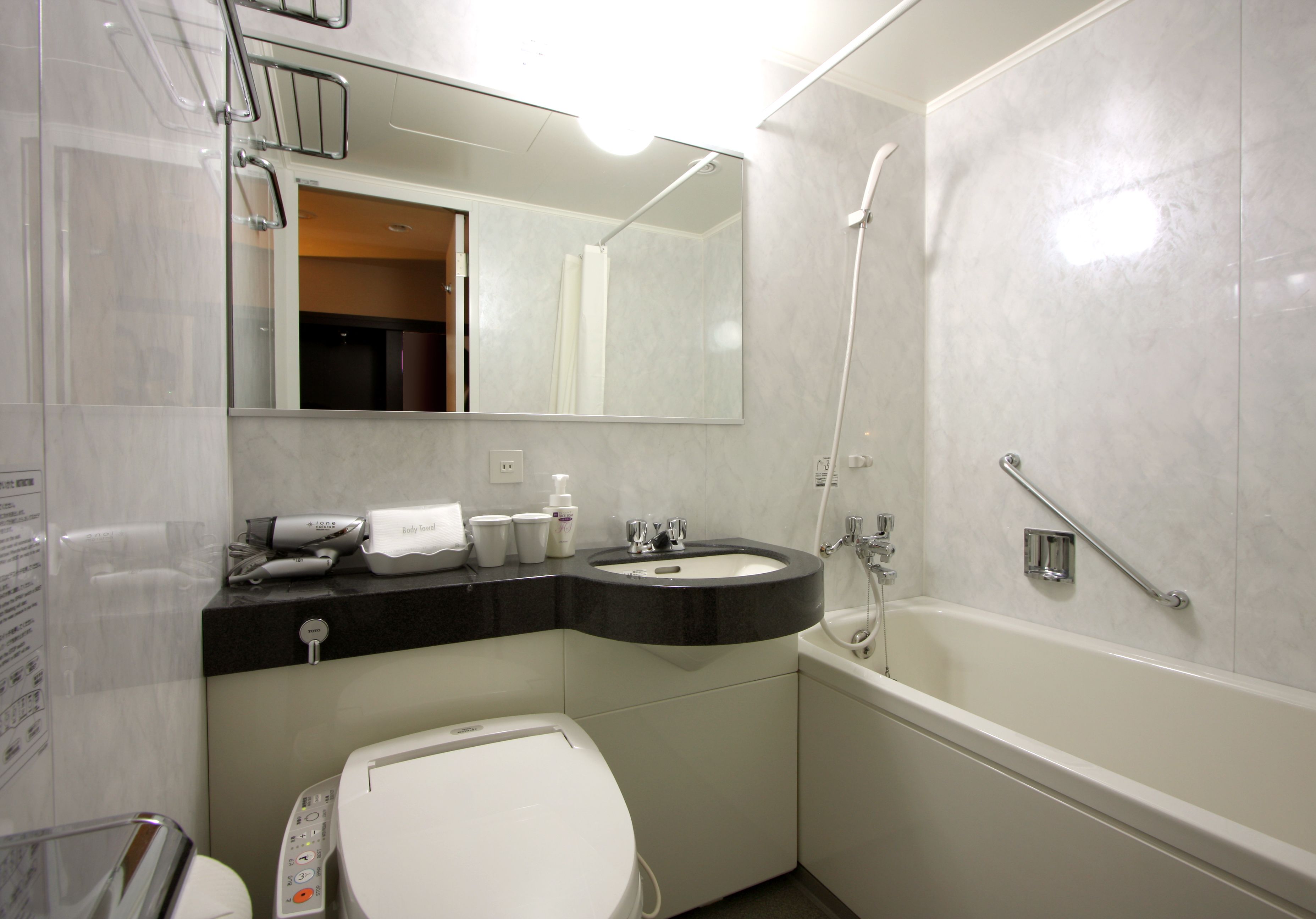 free toiletries, hair dryer, slippers, electronic bidet