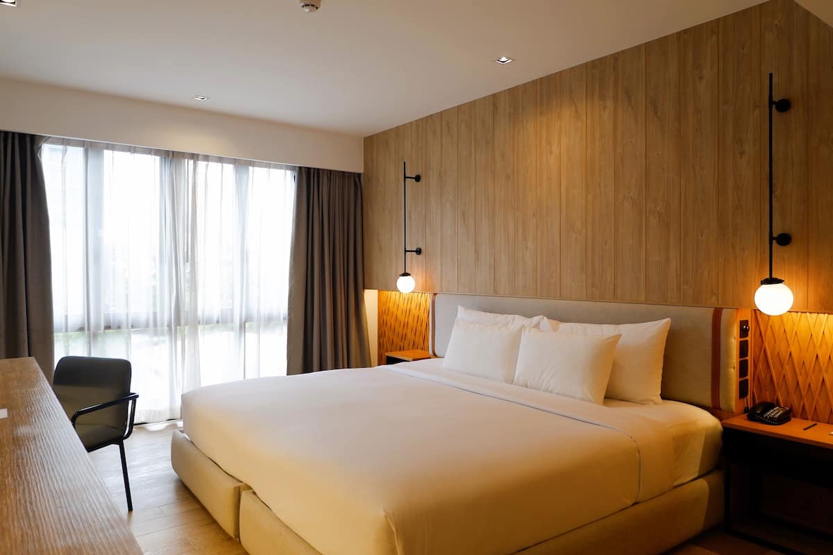 Camera Deluxe, 1 letto king | 1 camera, minibar, cassaforte in camera, postazione laptop