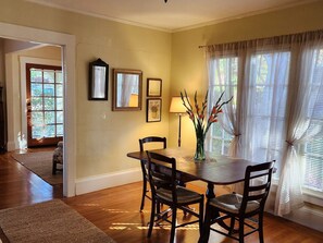 Dining table seats three.