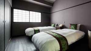 A hotel room with two beds, a large window, and a wooden floor. - Eigetsu (Kyoto)