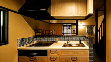 EAST Deluxe Suite | Private kitchenette | Fridge, microwave, stovetop, coffee/tea maker