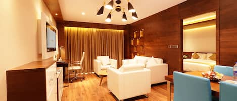 Luxury Suite | 1 bedroom, premium bedding, minibar, in-room safe