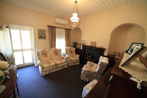 Traditional Cottage, 3 Bedrooms, Garden View, Courtyard Area | Living room | Flat-screen TV, fireplace - Miss Mabel Cottage - Adults Only (Burra)