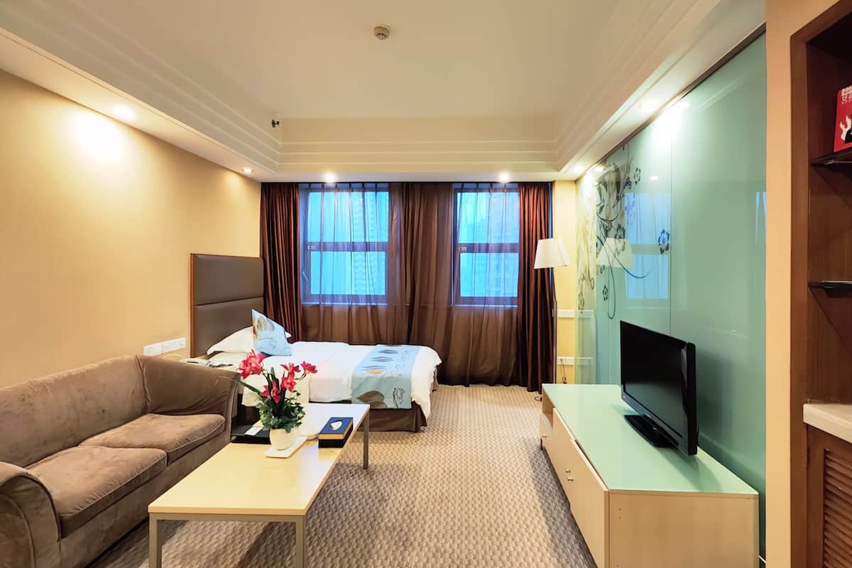 Kamar Triple Keluarga | Brankas, setrika/meja setrika, Wi-Fi gratis, dan seprai linen