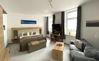 Deluxe Double Room | Hypo-allergenic bedding, desk, blackout drapes, iron/ironing board