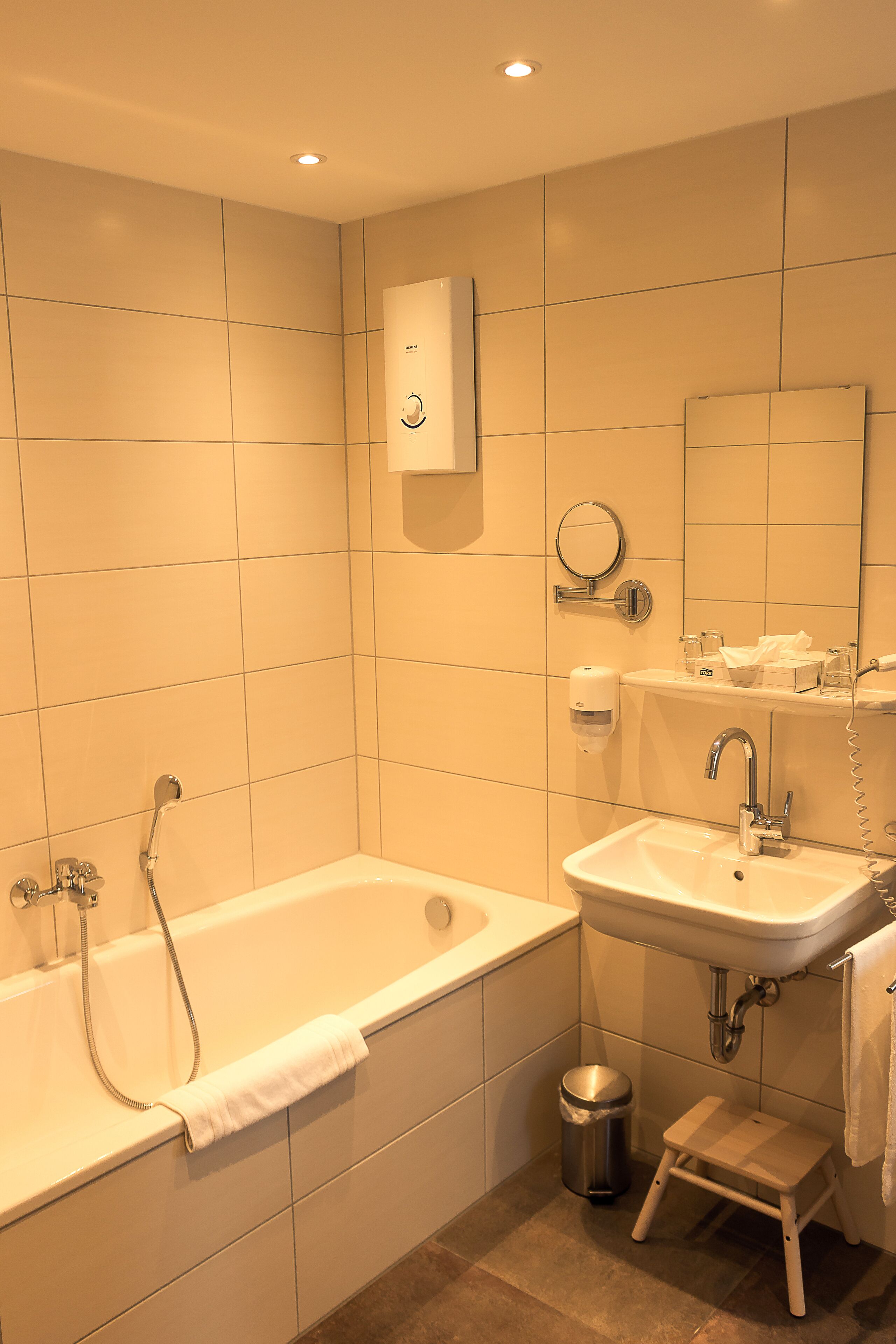 deluxe double room | bathroom | shower, free toiletries, hair dryer, towels