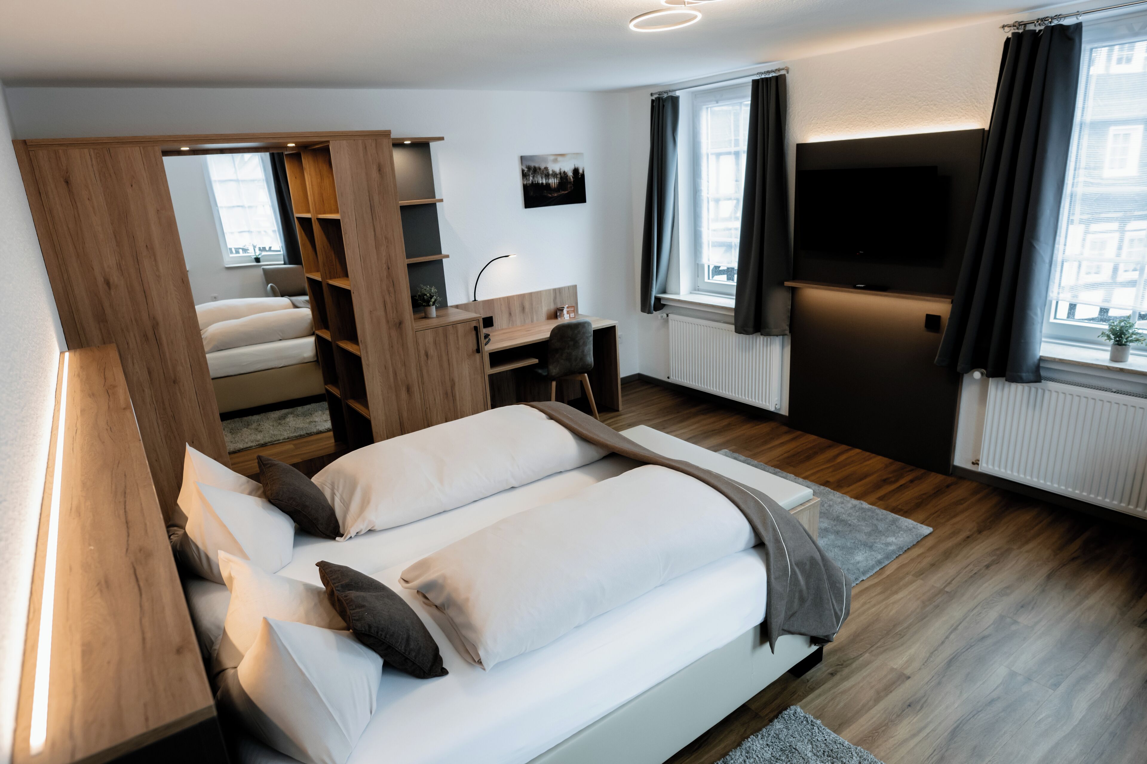 Deluxe-Doppelzimmer | Wohnbereich | Plasmafernseher