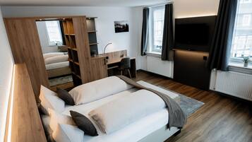 Deluxe-Doppelzimmer | Wohnbereich | Plasmafernseher