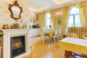 Family Suite, 2 Bedrooms, Sauna | Living area | Flat-screen TV, heated floors - Apartmán Nostalgia (Karlovy Vary)