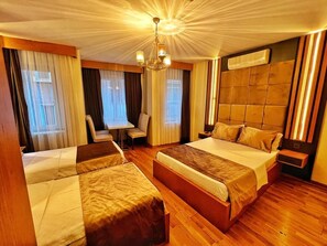 Standard Quadruple Room | In-room safe, desk, soundproofing, iron/ironing board - Taksim Cetinkaya Suite (Istanbul)
