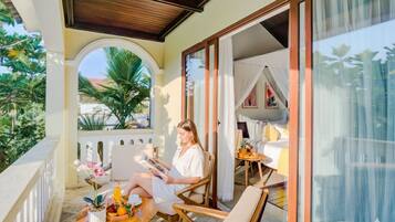 Deluxe Room, Balcony | In-room safe, desk, laptop workspace, blackout drapes