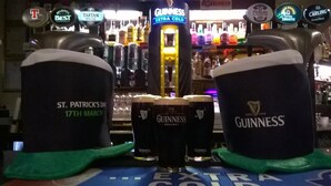 A bar with Guinness beer taps and glasses. - The Elbow Room (Kirkcaldy)