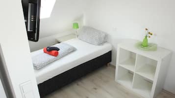 Departamento, 1 habitación | Escritorio, tabla de planchar con plancha, wifi gratis y ropa de cama 