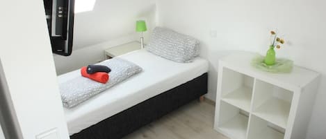 Apartment, 1 Bedroom | Desk, iron/ironing board, free WiFi, bed sheets