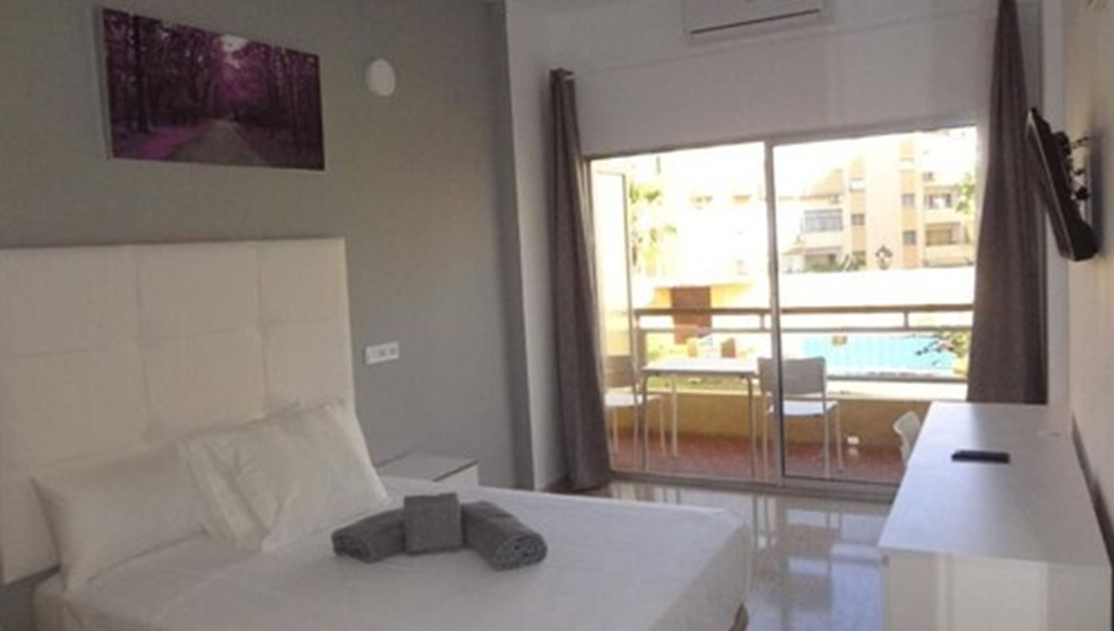 Double Room with Air Conditioning, and Terrace | Desk, blackout curtains, iron/ironing board, free WiFi