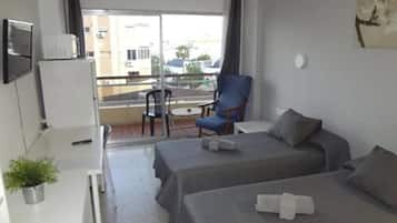 Double room with Fan and Terrace | Desk, blackout drapes, iron/ironing board, free WiFi