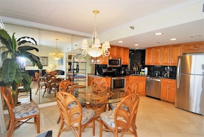 Condo, 2 Bedrooms | Private kitchen | Microwave, dishwasher, cookware/dishes/utensils, dining tables