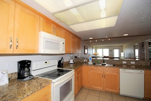 Condo, 2 Bedrooms | Private kitchen | Fridge, microwave, oven, coffee/tea maker