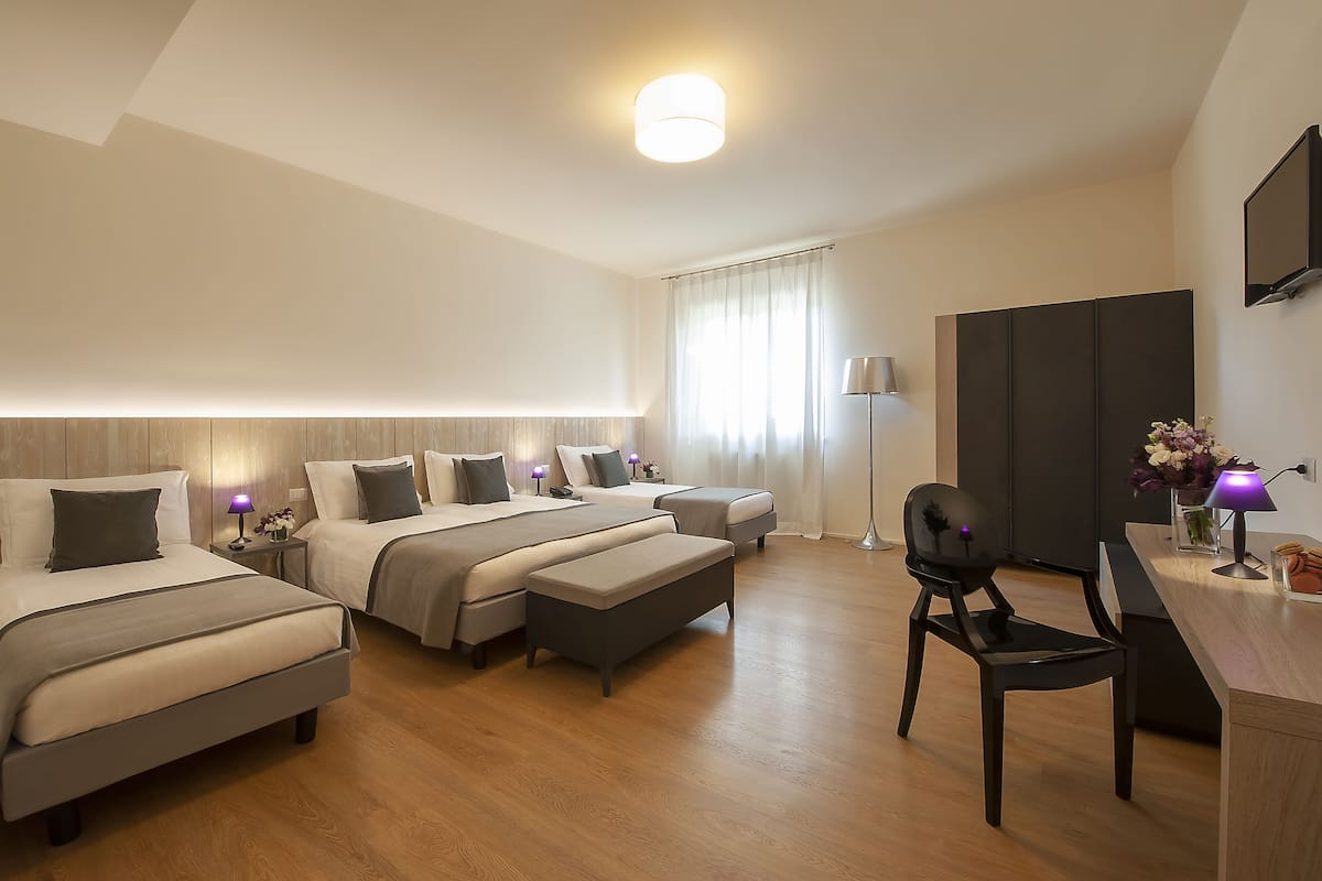 Family Room | Premium bedding, in-room safe, desk, soundproofing