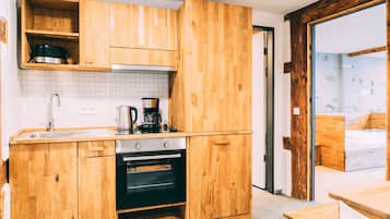 Family Suite, 2 Bedrooms | Private kitchen | Fridge, oven, stovetop, dishwasher