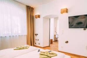 Suite, 1 Bedroom, Ground Floor | Soundproofing, iron/ironing board, cribs/infant beds, free WiFi