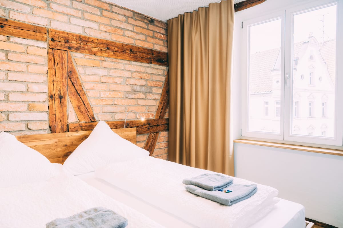 Familien-Suite, 2 Schlafzimmer | Schallisolierte Zimmer, Bügeleisen/Bügelbrett, Babybetten