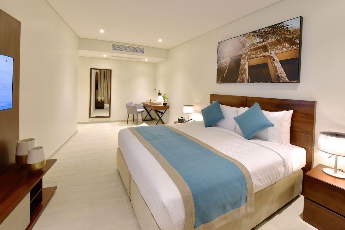 Deluxe Apartment, 2 Bedrooms, Sea View | In-room safe, desk, blackout curtains, soundproofing