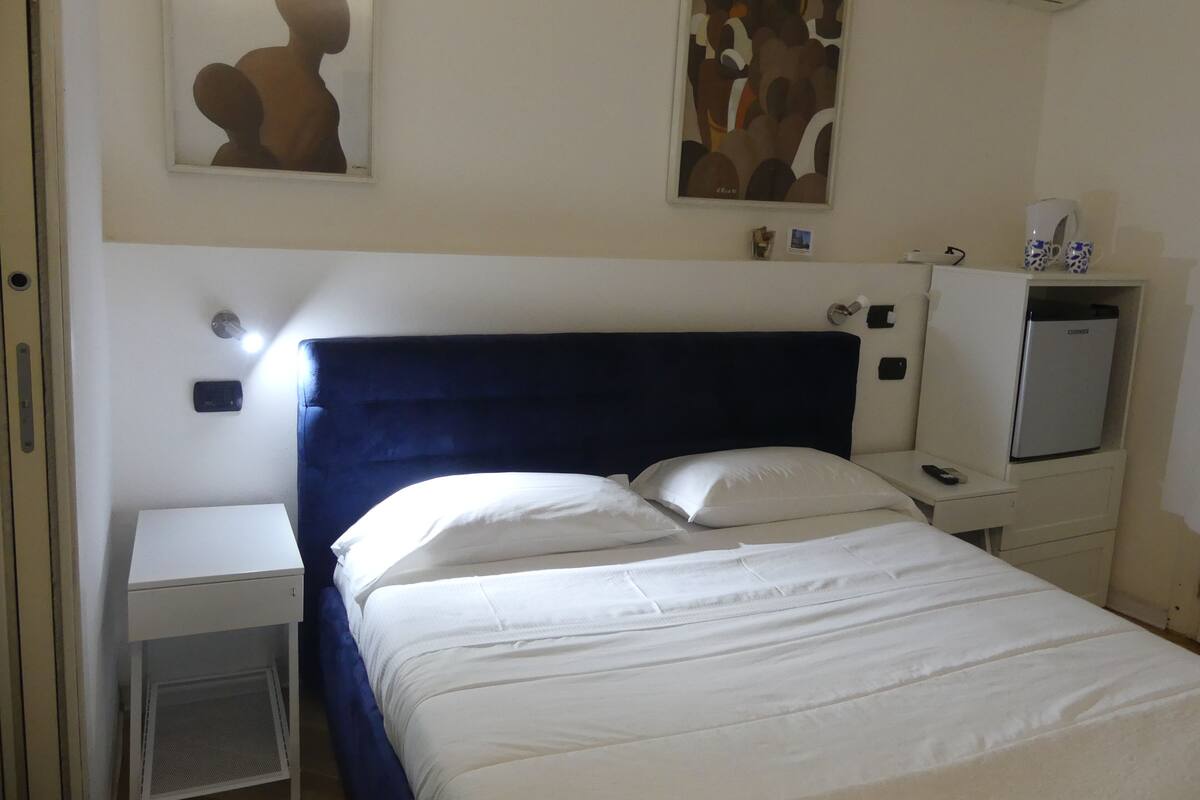 Blackout curtains, iron/ironing board, free WiFi, bed sheets
