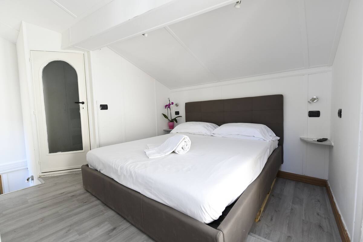 Blackout curtains, iron/ironing board, free WiFi, bed sheets