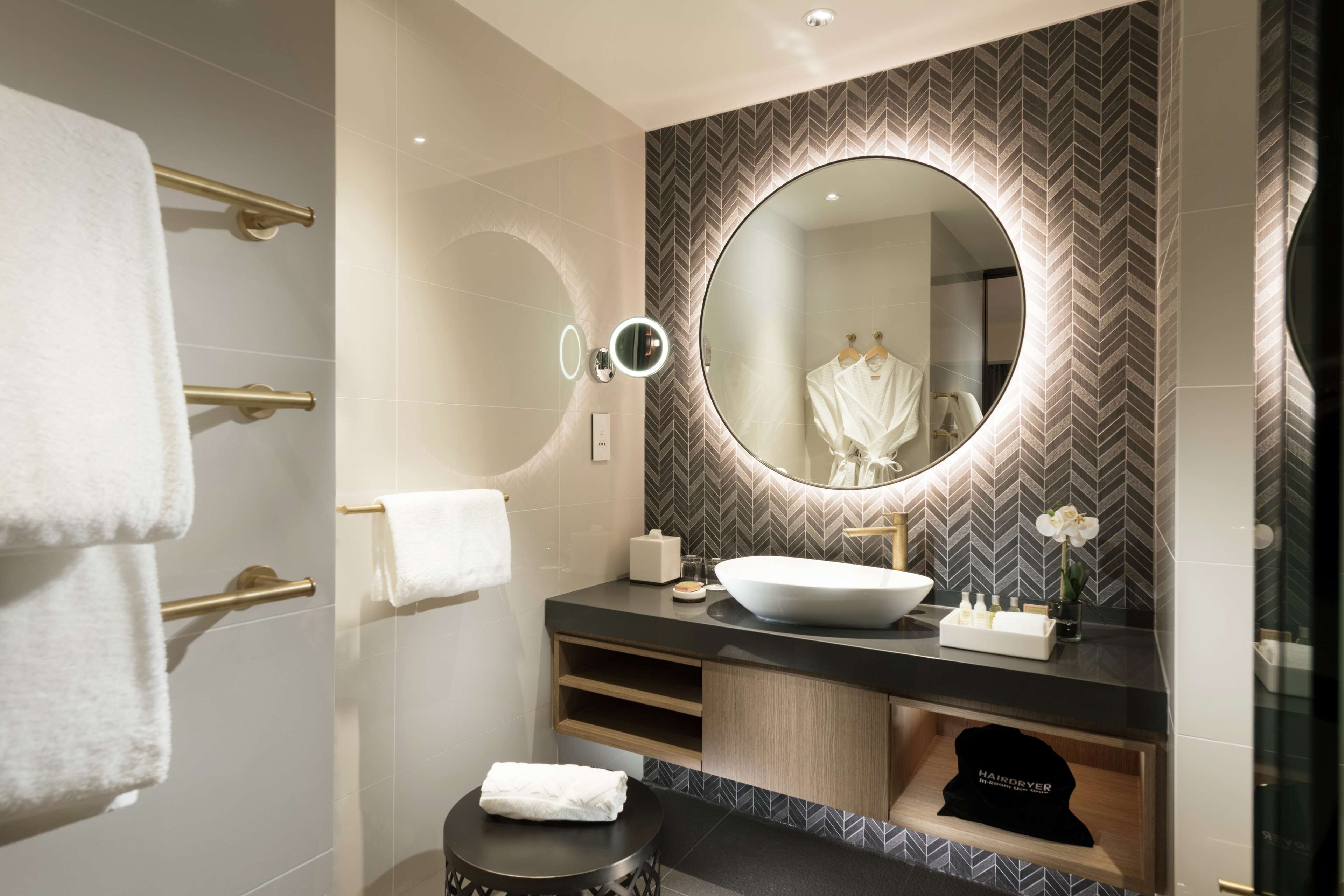 Designer toiletries, hair dryer, bathrobes, towels