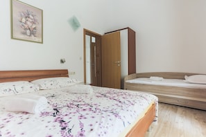 Apartment, 1 Bedroom, Balcony | Individually decorated, desk, iron/ironing board, free cots/infant beds