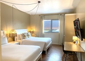 Deluxe Quadruple Room, 2 Queen Beds (External Bathroom) | Hypo-allergenic bedding, down comforters, in-room safe, laptop workspace - Magnolia Inn (Panama City)