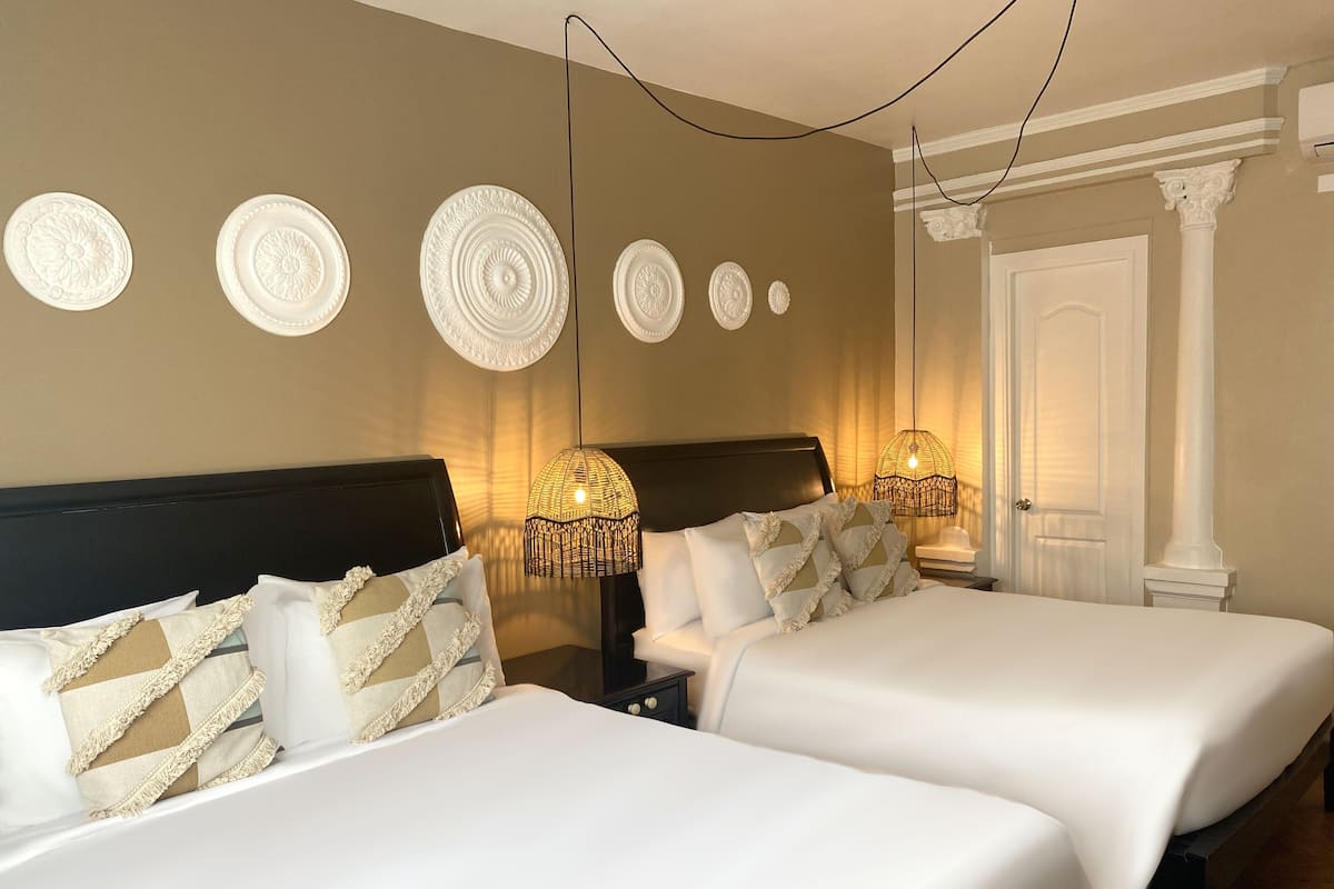 Hypo-allergenic bedding, down duvets, in-room safe, laptop workspace
